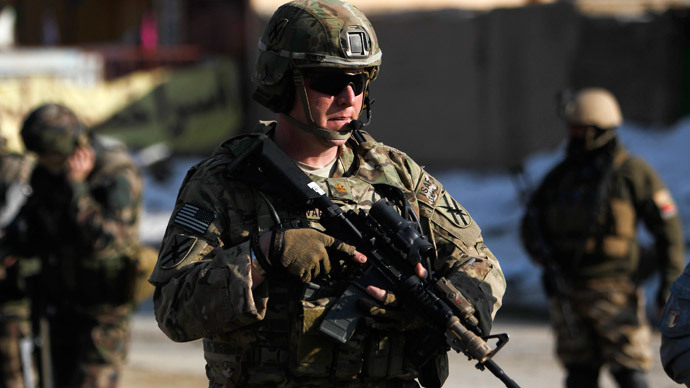 NATO troops arrive at the site of a suicide car bomb attack in Kabul, February 10, 2014.(Reuters / Omar Sobhani)