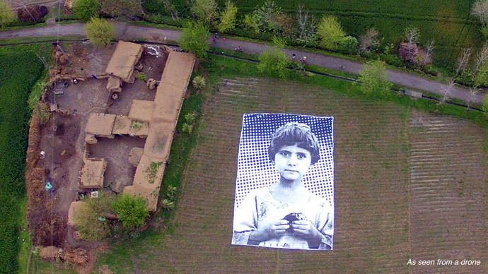 ‘Not bug splats’: Artists use poster-child in Pakistan drone protest