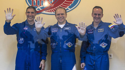 ISS crew lands, brings space-born flies to Earth
