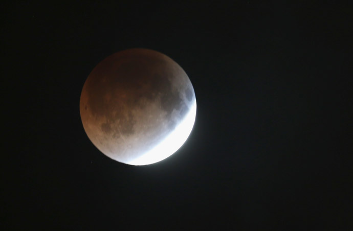 The moon is seen as it heads into a total lunar eclipse on April 15, 2014 in Miami, Florida. (Joe Raedle / Getty Images / AFP)