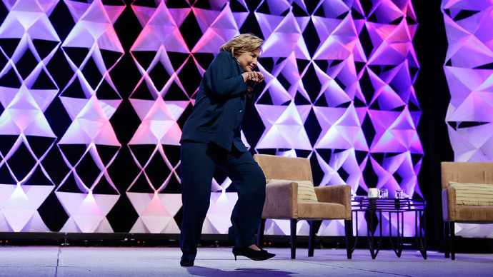 Feds charge woman who hurled shoe at Hillary Clinton