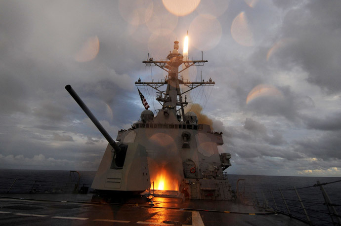 The guided-missile destroyer USS Mustin (DDG 89) fires a Standard Missile 2 (SM-2) missile from the ship's forward and aft missile decks during a missile exercise in the Pacific Ocean (Reuters / Devon Dow / U.S. Navy photo / Handout)