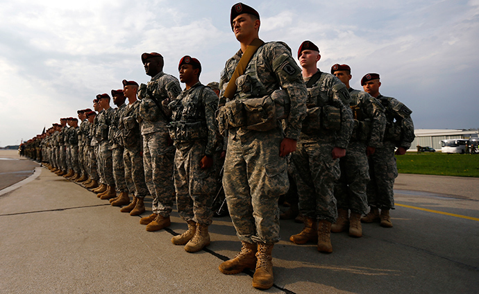 The first company-sized contingent of about 150 U.S. paratroopers from the U.S. Army's 173rd Infantry Brigade Combat Team based in Italy march attend a welcoming ceremony as they arrive to participate in training exercises with the Polish army in Swidwin, northern west Poland April 23, 2014 (Reuters / Kacper Pempel)