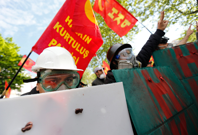 Protesters hold makeshift shields ahead of a May Day demonstration in central Istanbul May 1, 2014 (Reuters / Murad Sezer)