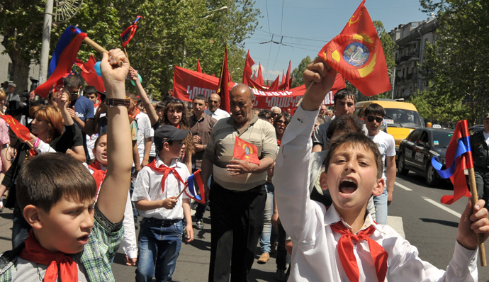 Armenian Pioneers, members a the youth Communist group, created in the Soviet Union for the 10-14-year-old children, parade in Yerevan, on May 1, 2014, during May Day celebrations (AFP Photo / Karen Minasyan)