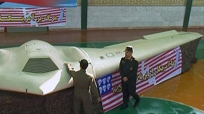 A grab taken from the Iranian state-run Press TV on December 8, 2011 shows what Iranian officials claim is the US RQ-170 Sentinel high-altitude reconnaissance drone that crashed in Iran on December 4, 2011 displayed at an undisclosed location. (AFP Photo)