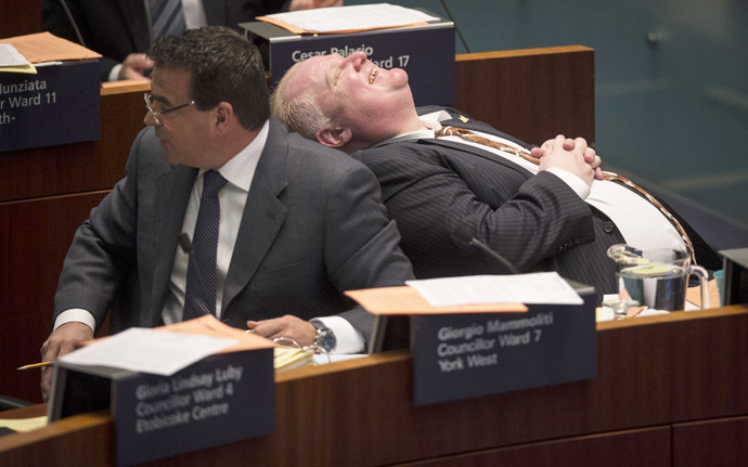 Toronto Mayor Rob Ford laughs during council beside councillor Giorgio Mammoliti at City Hall in Toronto, November 14, 2013. (Reuters/Mark Blinch)