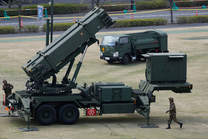 Japan Self-Defence Forces soldiers prepare to refuel a unit of Patriot Advanced Capability-3 (PAC-3) missiles (Reuters)