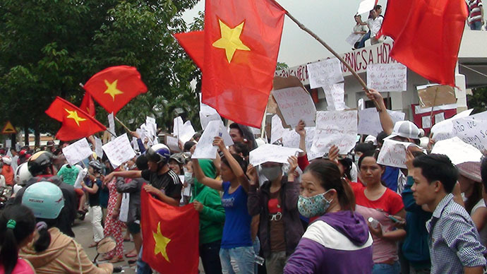Amid riots, China blames Vietnam over disputed territory rift