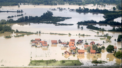 ​Inspiring images: People risk their lives saving animals from devastating Balkans flood