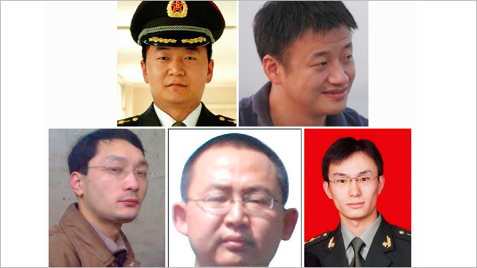 A combination photo shows five Chinese military officers who the U.S. has accused of cyber espionage. (Reuters/FBI)