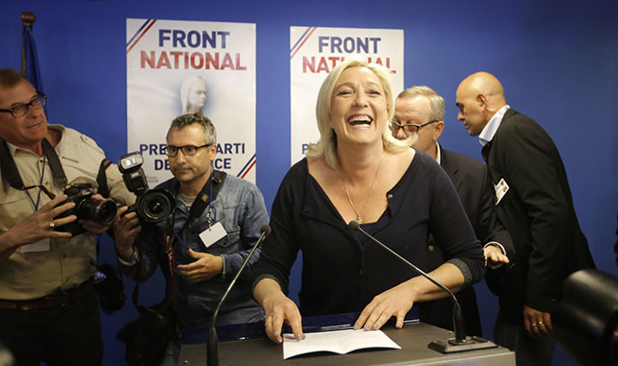 Marine Le Pen, France's National Front political party head, reacts to results after the polls closed in the European Parliament elections at the party's headquarters in Nanterre, near Paris, May 25, 2014. (Reuters / Christian Hartmann)