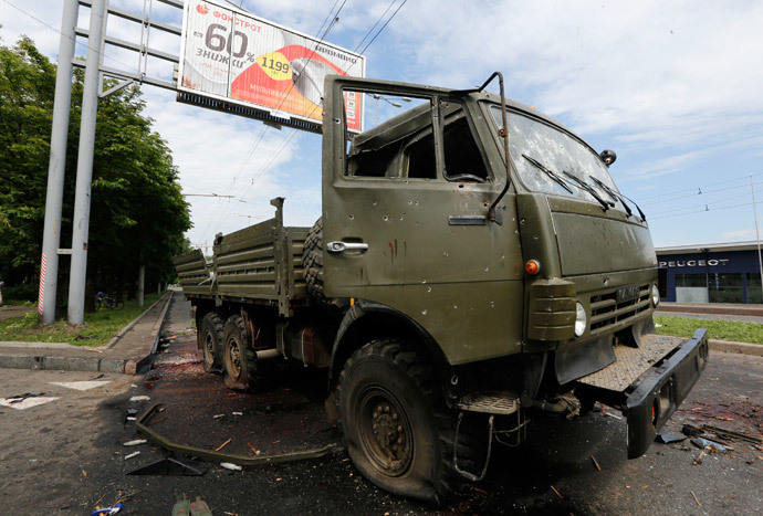 A wrecked Kamaz truck is seen near the Donetsk airport May 27, 2014. (Reuters / Yannis Behrakis)