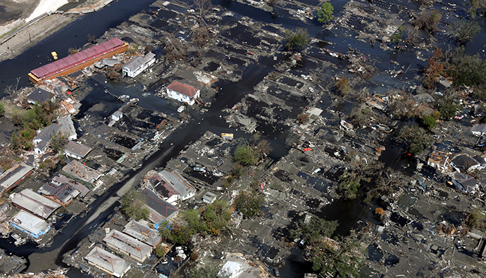 A barge (top Left) sits in a neighborhood destroyed by Hurricane Katrina September 11, 2005, in New Orleans (Reuters / David J. Phillip)