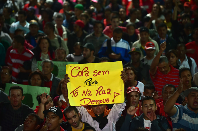 Members of social movements take part in the so-called "World Cup without the people, I'm in the street again" protest against the upcoming FIFA World Cup Brazil 2014 in Sao Paulo, Brazil on June 4, 2014. (AFP Photo / Nelson Almeida) 