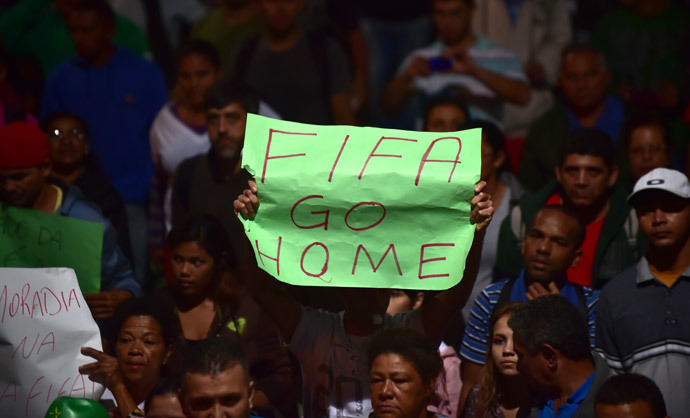 Members of social movements take part in the so-called "World Cup without the people, I'm in the street again" protest against the upcoming FIFA World Cup Brazil 2014 in Sao Paulo, Brazil on June 4, 2014. (AFP Photo / Nelson Almeida) 