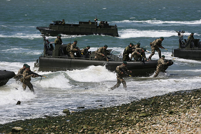 Royal Marines take part in a display during a D-Day event in Portsmouth June 5, 2014. (Reuters / Stefan Wermuth)