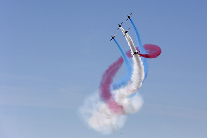 The UK's Royal Air Force aerobatic team, the Red Arrows, perform during D-Day celebrations in Portsmouth on June 5 2014. (Reuters / Stefan Wermuth)