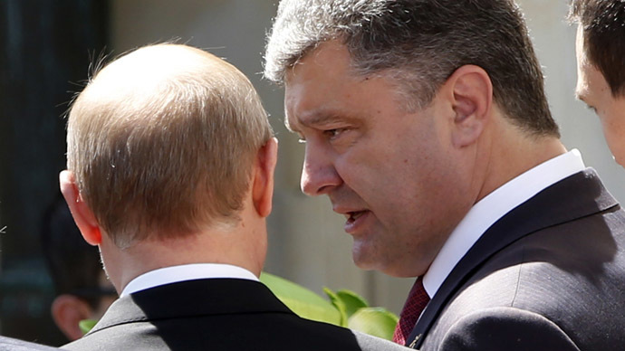 Putin hails Poroshenko's 'positive thinking' on settling crisis after D-Day meeting