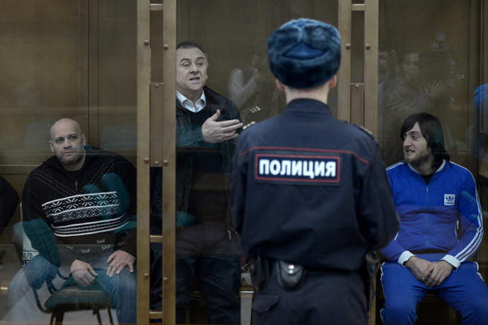 From left: Sergei Khadzhikurbanov, Lom-Ali Gaitukayev and Ibragim Makhmudov, defendants in the Novaya Gazeta columnist Anna Politkovskaya murder case, during trial in the Moscow City Court. (RIA Novosti/Evgeny Biyatov)