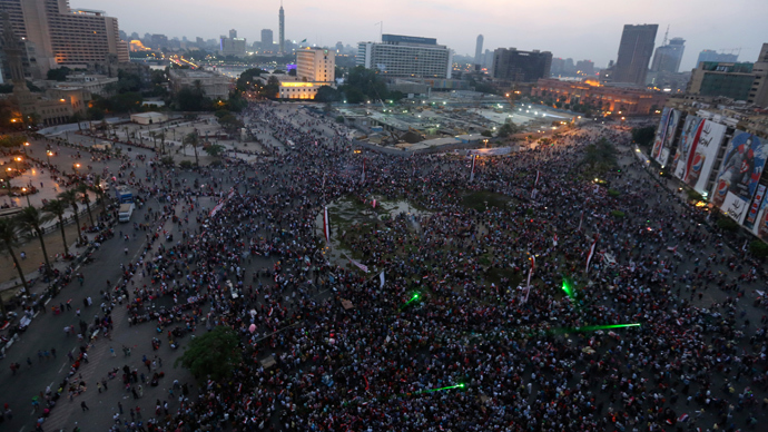 Egyptians celebrate after the swearing-in ceremony of President elect Abdel Fattah al-Sissi in Tahrir square in Cairo, June 8, 2014 (Reuters / Mohamed Abd El Ghany)