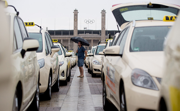 Taxi drivers protest on June 11, 2014 in Berlin. (AFP Photo / DPA / Joerg Carstensen / Germany out)