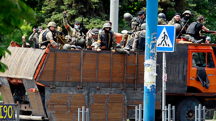 Fatalities as Kiev's military 'reclaim' first eastern city