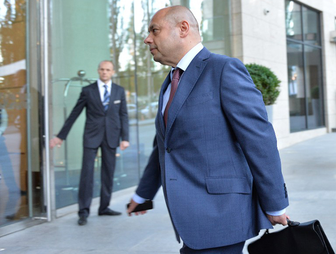 Ukrainian Minister of Energy and Coal Industry Yury Prodan arrives to take part in the next round of gas supply talks with Russian Gazprom company in Kiev on June 14, 2014. (AFP Photo / Genya Savilov)
