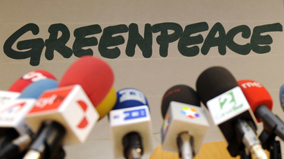 Greenpeace executive to stop flying to work after public uproar