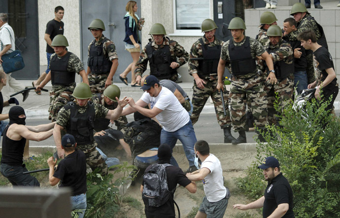 Security guards scuffle with protesters during a rally near the Russian consulate-general in Odessa June 16, 2014. (Reuters)