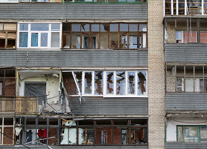 A building damaged by shelling from government forces is seen in the eastern Ukranian city of Slaviansk June 16, 2014. (Reuters / Shamil Zhumatov)