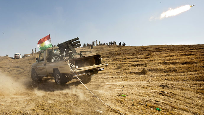 Kurdish Peshmerga forces fire missiles during clashes with militants of the Islamic State of Iraq and the Levant (ISIL) jihadist group in Jalawla in the Diyala province, on June 14, 2014. (AFP Photo / Rick Findler)