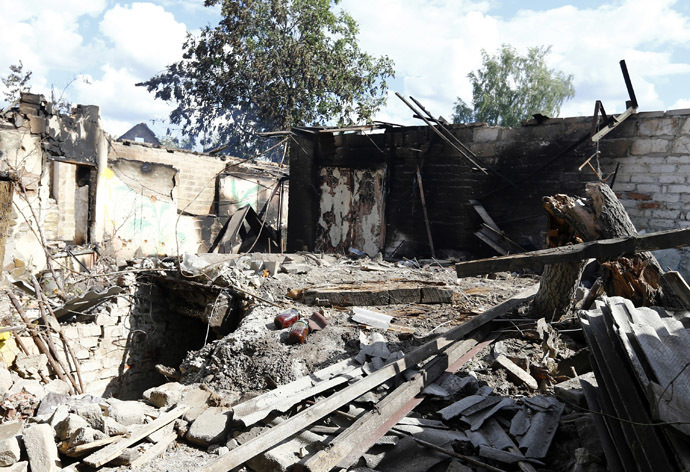 A house damaged by fighting between Ukrainian and and anti-government forces is seen in the eastern Ukranian city of Slaviansk June 16, 2014. (Reuters/Shamil Zhumatov)