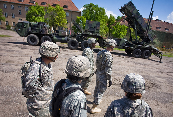 US soldiers stand in front of a Patriot missile battery at an army base in the northern Polish town of Morag (AFP Photo)