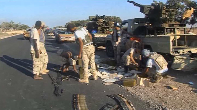 Armed militants and gangsters in the streets of Libya (RT video screenshot)