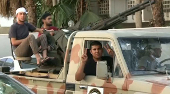 Armed militants and gangsters in the streets of Libya (RT video screenshot)