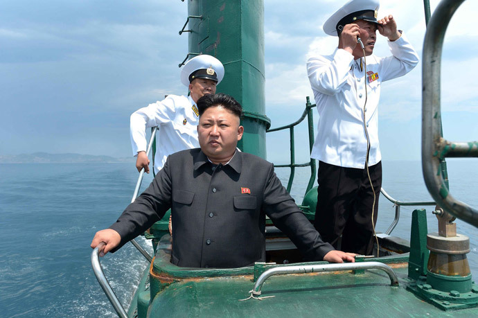 North Korean leader Kim Jong-Un (C), (AFP Photo / KCNA via KNS Republic of Korea out)