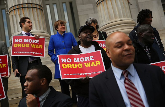 Elected officials, community leaders and local activists attend a rally outside Brooklyn borough hall in support of the district attorney's plans to end prosecuting minor marijuana offenses on April 25, 2014 in New York City. (AFP Photo / Getty Images / Spencer Platt)