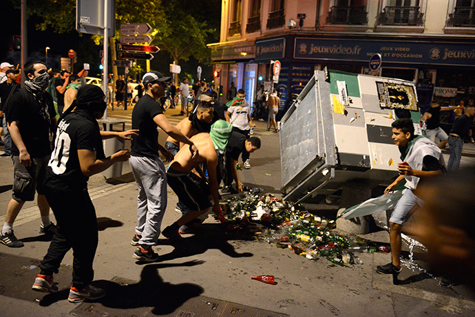 Algerian fans celebrate in Lyon on June 26, 2014 after Algeria eliminated Russia with a 1-1 draw in a FIFA 2014 World Cup Group H match (AFP Photo)