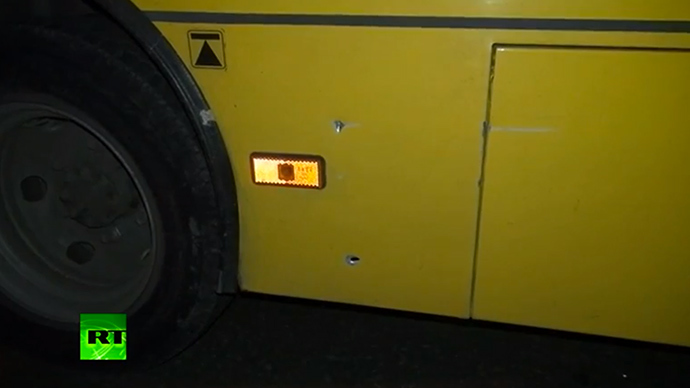Alleged bullet holes in the bus (screenshot from RT video)