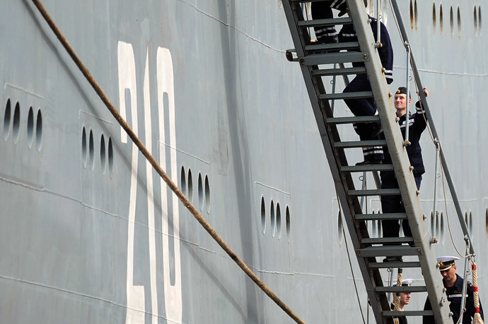 Russian sailors climb stairs of the Smolniy on June 30, 2014 in Saint-Nazaire, western France.(AFP Photo / Jean-Sebastien Evrard)
