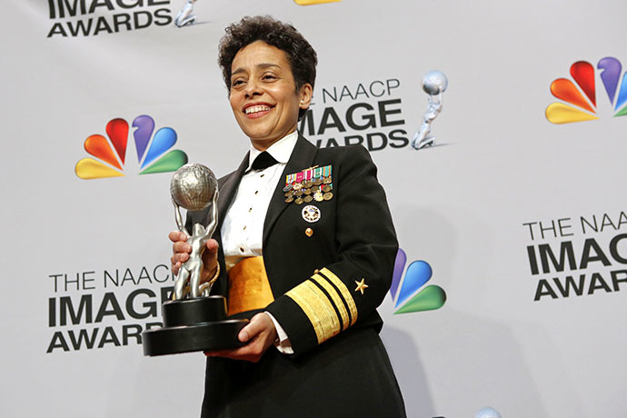 Vice Admiral Michelle Howard poses with her special honors trophy in the press room at the 44th NAACP Image Awards at the Shrine Auditorium in Los Angeles, California, February 1, 2013. (Reuters / Patrick Fallon)