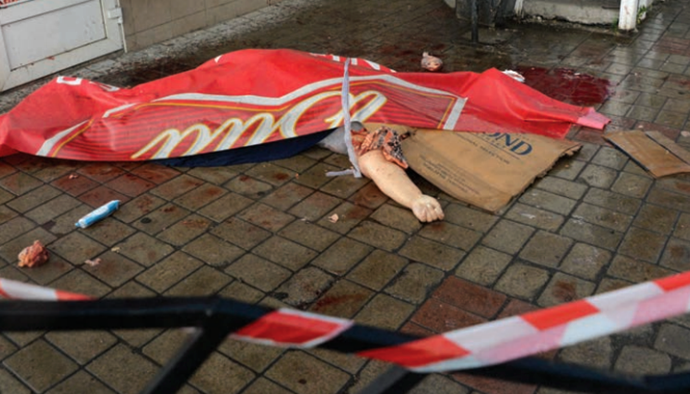 A woman killed during an artillery shelling of the Donetsk railway station (Image from mid.ru)