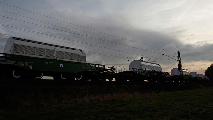 Train transporting CASTOR containers, which carry radioactive nuclear waste, next to a field near Goettingen (Reuters / Alex Domanski)