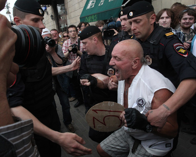 Police detain participants in the Strategy 31 unauthorized rally on Triumfalnaya Square in Moscow. (RIA Novosti/Evgeny Biyatov)
