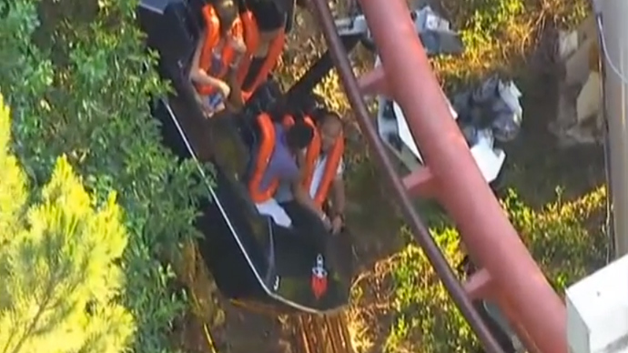 22 people trapped on 'Ninja Ride' roller coaster after tree falls on tracks