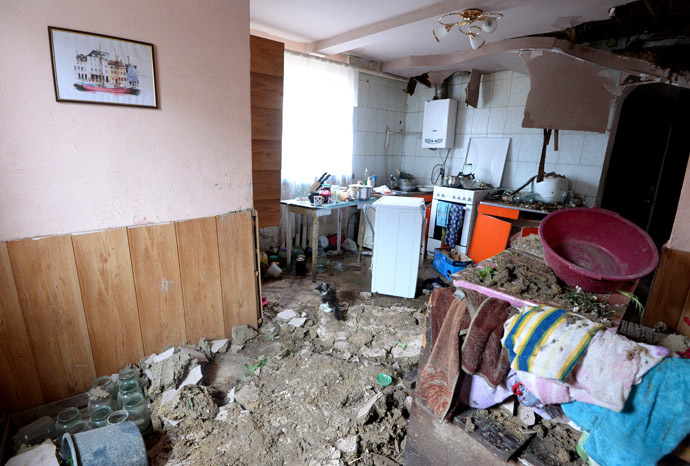 A house in the residential settlement Bolshaya Vergunka, on the outskirts of Lugansk, ruined by an artillery shelling of the Ukrainian army. (RIA Novosti/Mikhail Voskresenskiy)