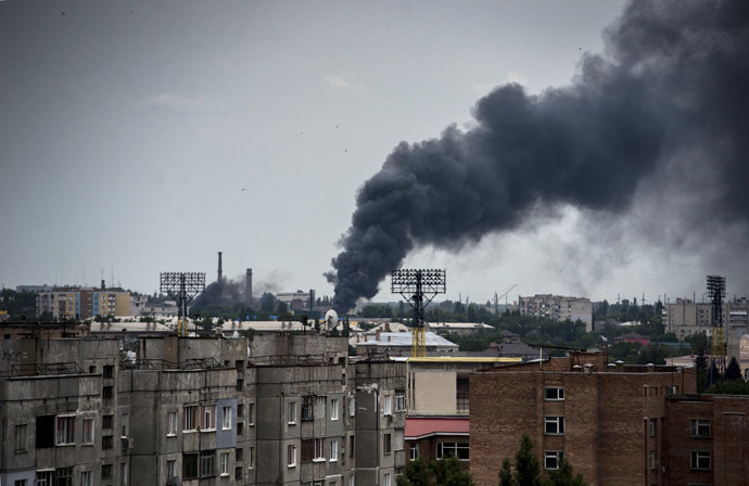 The town of Lugansk during an artillery attack. (RIA Novosti/Valeriy Melnikov)