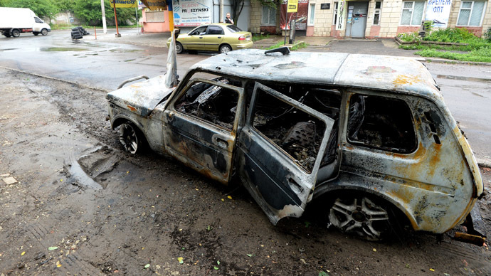 A car burnt during an artillery shelling of the Ukrainian army. (RIA Novosti/Mikhail Voskresenskiy)