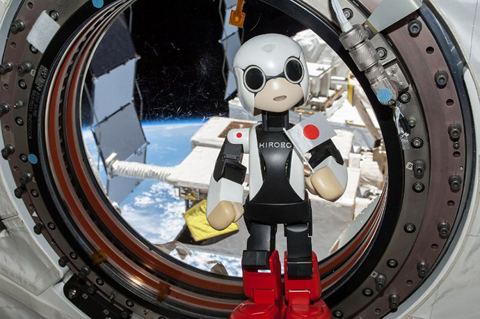 This handout photo taken on August 21, 2013 and released from 2013.KIBO-ROBOT on September 5, 2013 shows humanoid robot Kirobo 'speaking' in the International Space Station (ISS). (AFP Photo)